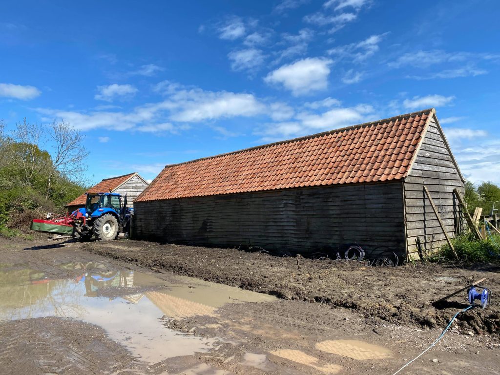 Tractor Next To The Stable Conversions